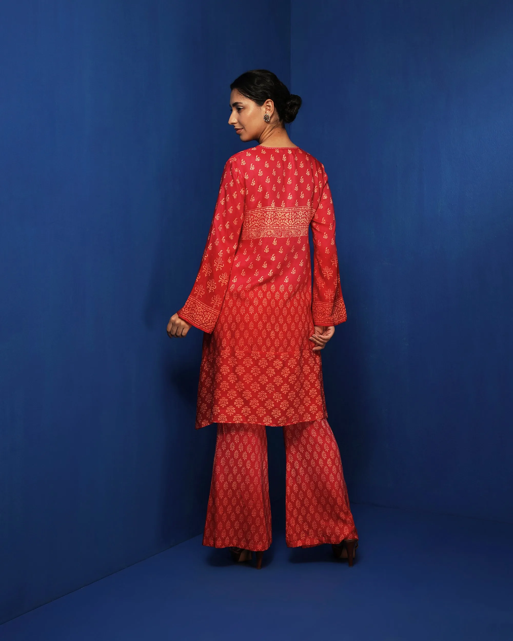 Red ombre-printed bell-bottom pants