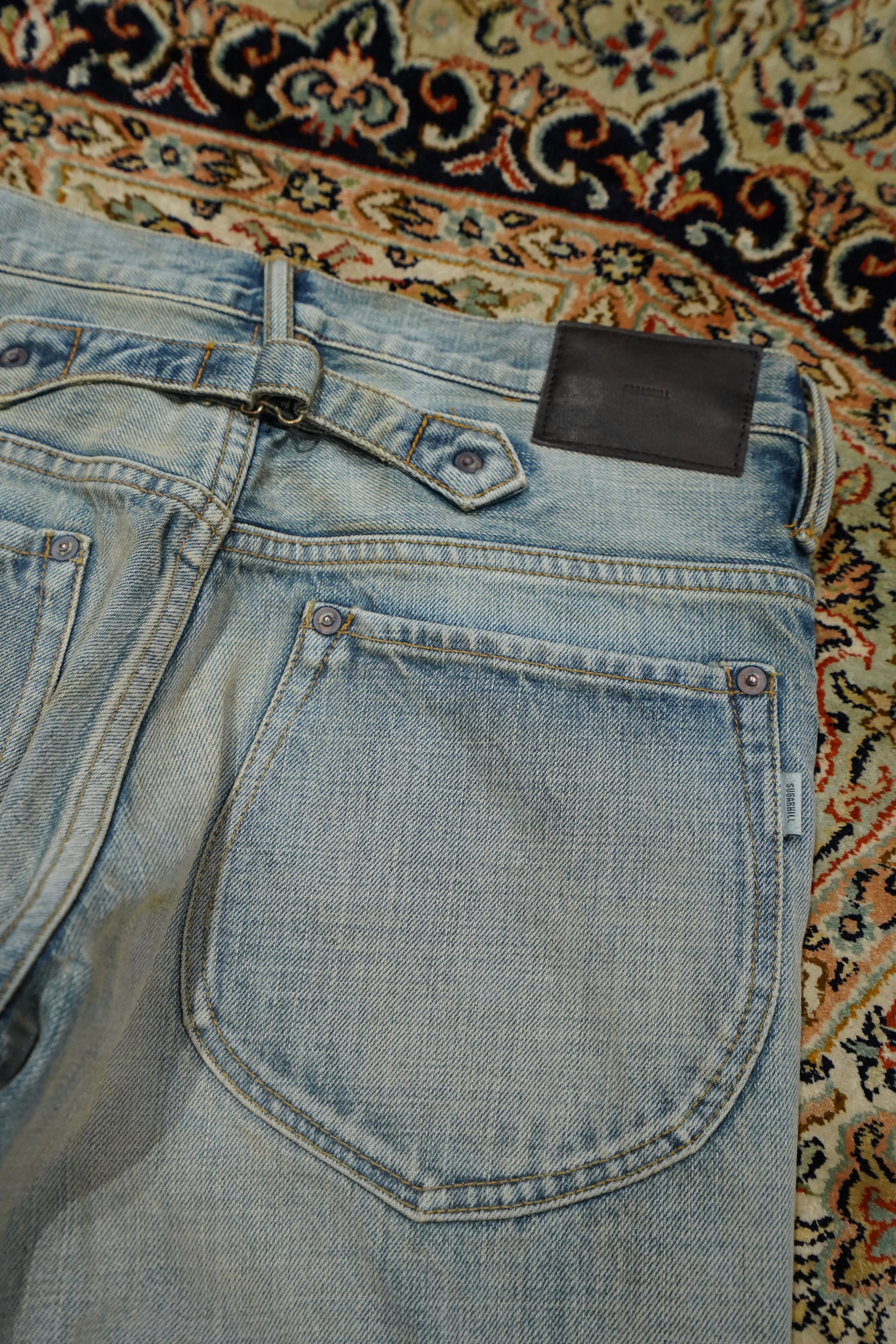 SUGARHILL FADED BELL-BOTTOM DENIM PANTS