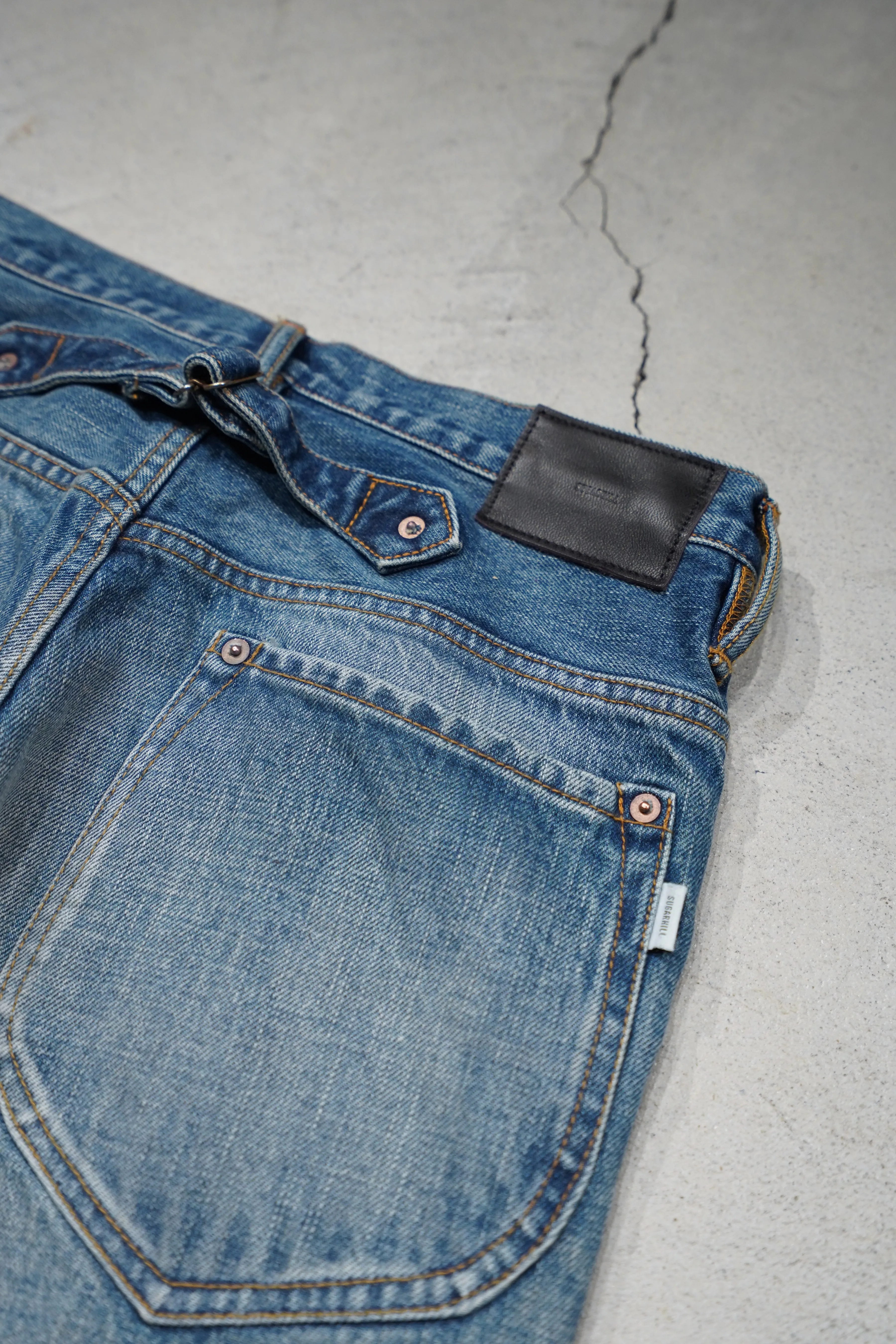 SUGARHILL FADED BELL BOTTOM DENIM PANTS